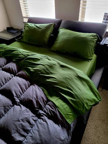 bed with the greenish  bamboo sheets