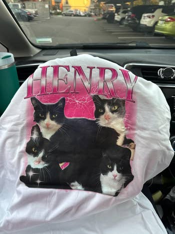 A t-shirt with 3  feline  images and the substance   