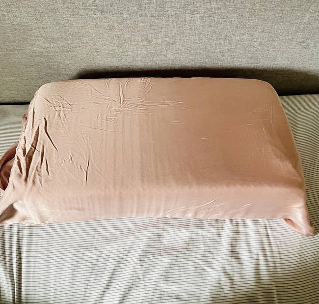 the rectangle-shaped pillow on a bed