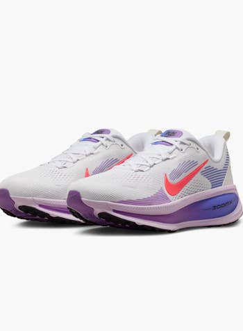 Athletic sneakers with a sleek design, featuring a salient swoosh logo, suitable for moving and casual wear