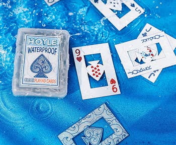 the cards and the case in the water