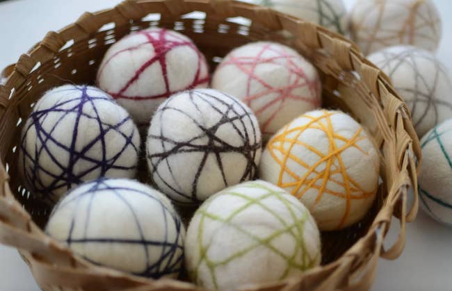 basket filled with seven wool dryer balls