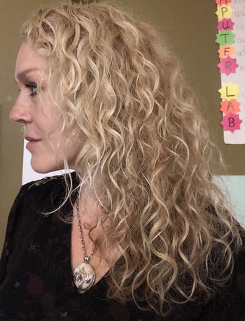 Reviewer's hair after using curling cream from Cantu