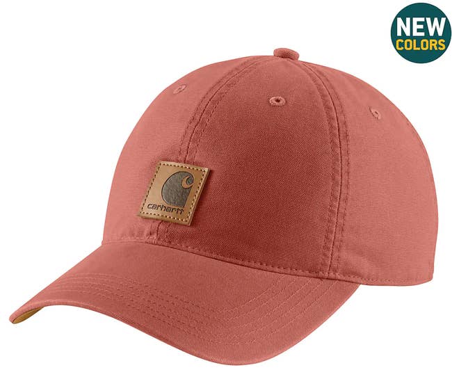 A faded reddish pink baseball hat 