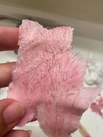 reviewers wax strip with hair on it