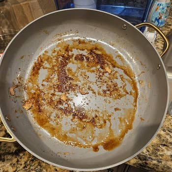 dirty a pan with caked on grease