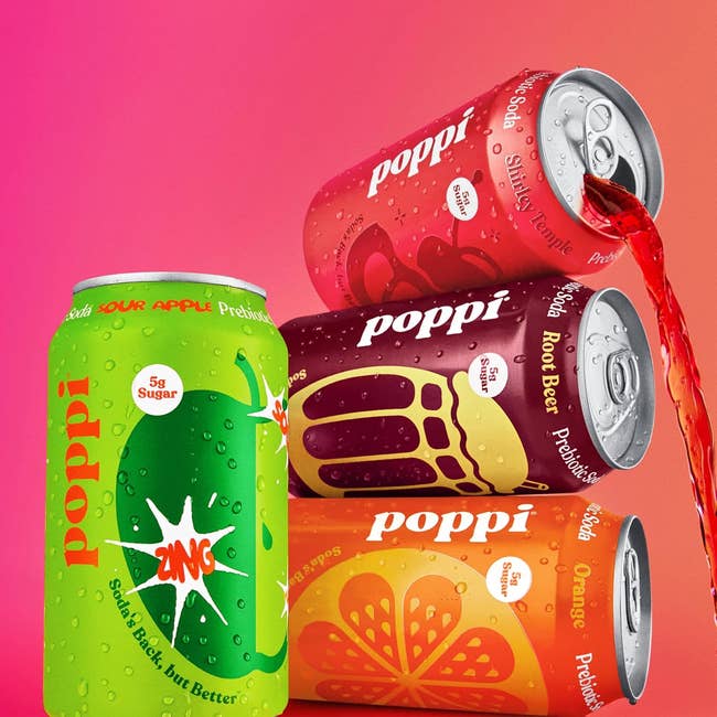 Four cans of Poppi prebiotic soda, including apple, basal beer, and orangish flavors, with 1 tin pouring retired portion attractively