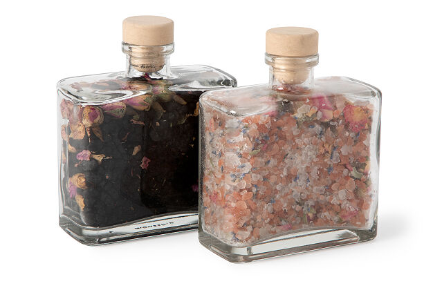 the set of bath crystals in glass jars