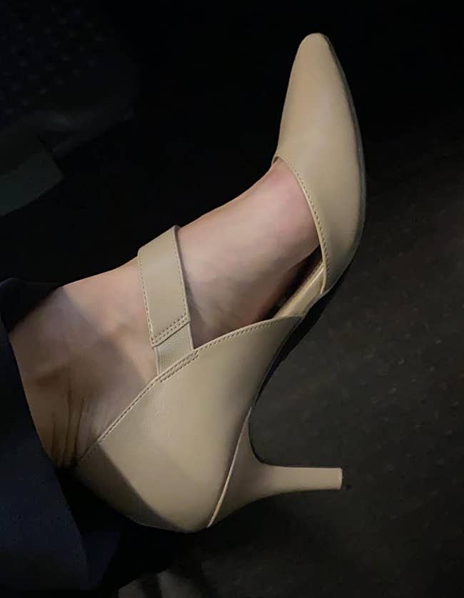 reviewer wearing the heels in beige