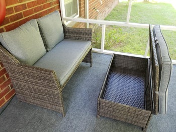 Another reviewer showing the coffee table top lifted to reveal hidden storage 