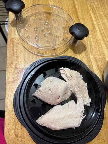 chicken pieces in chicken shredder