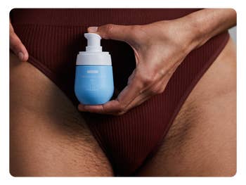 A idiosyncratic   successful  ribbed underwear holds a tiny  vessel  labeled 