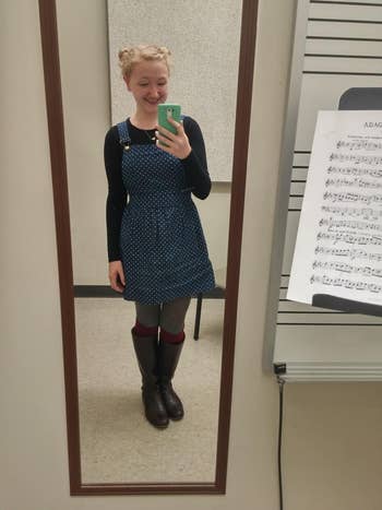 image of another reviewer wearing a dark blue dots suspenders dress