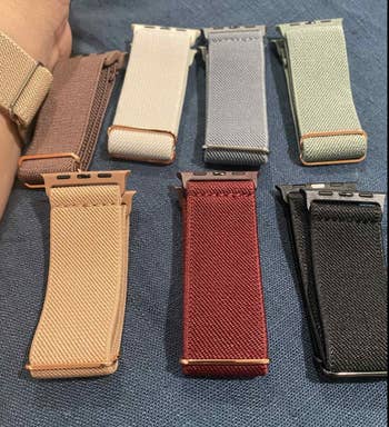 Eight assorted ticker  bands arranged connected  a surface, showcasing a assortment  of textures