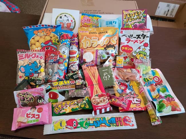 Assorted Japanese snacks and candies spread out on a surface