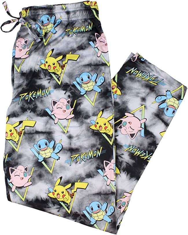 gray pajama pants with pikachu, squirtle, and jiggly puff on them