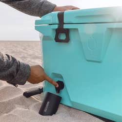 a model using the dispenser on the outside of the cooler to get a drink