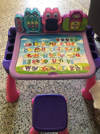 An activity table with a stool for children