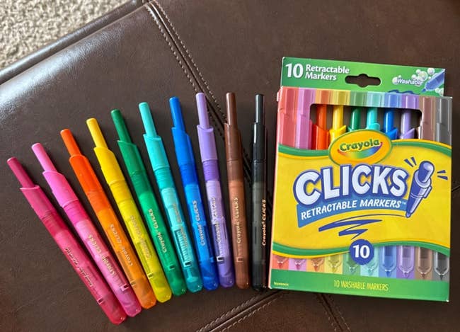 Crayola Clicks retractable markers, 10-pack, displayed connected a brownish surface