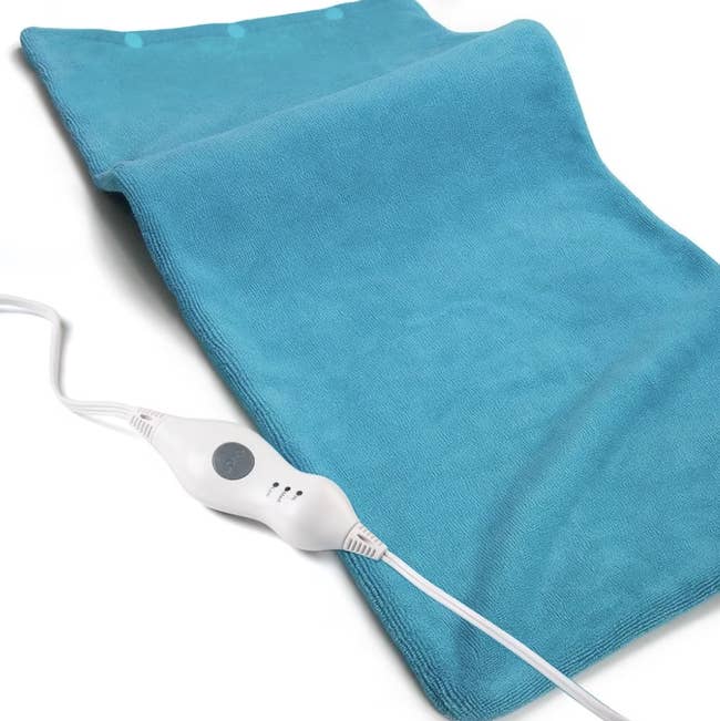 Heating pad with power control and cord, featuring a brushed cloth cover