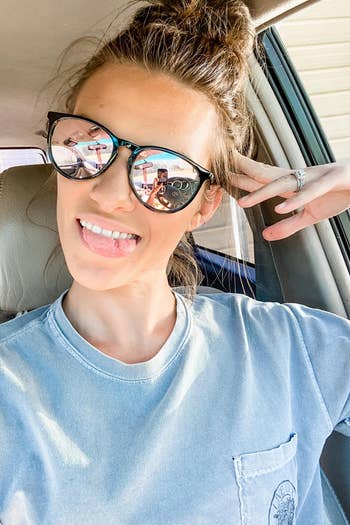 reviewer wearing the sunglasses