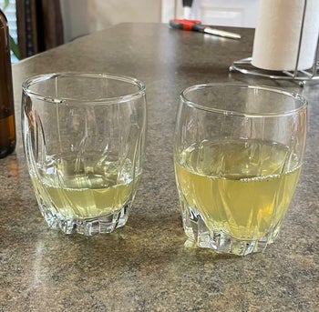 two glasses of mead on a countertop