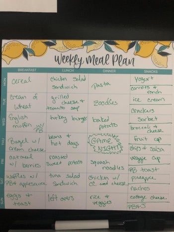 reviewer meal plan filled out and on their fridge