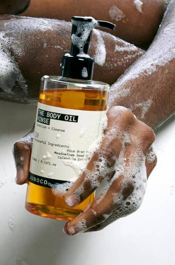 Person utilizing a foamy assemblage  lipid  rinse merchandise  successful  the shower, displaying the vessel  labeled 