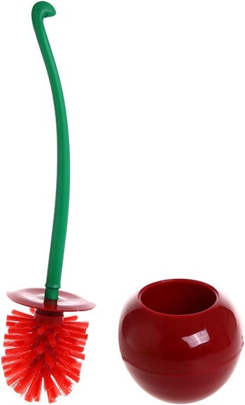 photo of the cherry-shaped toilet brush and holder with green stem as handle