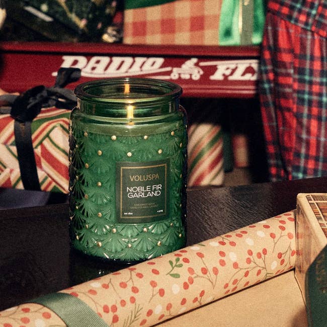 a pretty green glass candle jar