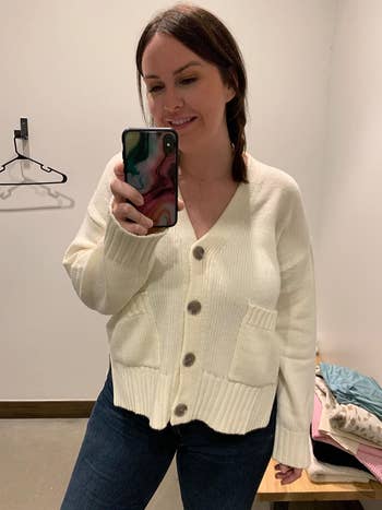 Reviewer wearing the cardigan in white