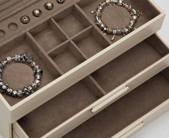 closeup of compartments in jewelry boxes
