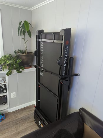 reviewer photo of folded treadmill