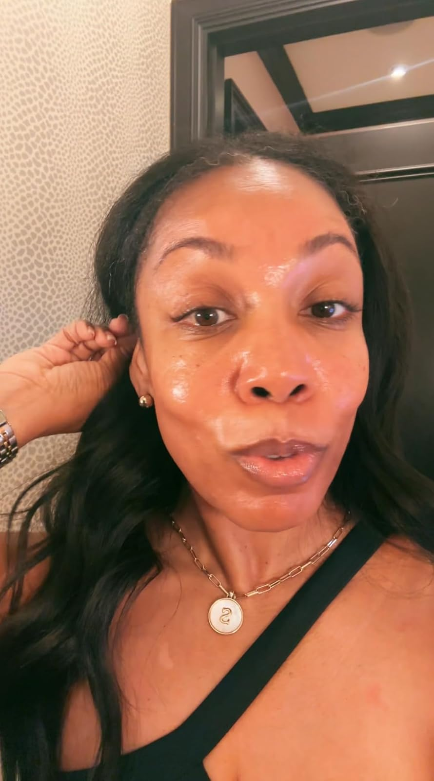 reviewer with glowy skin