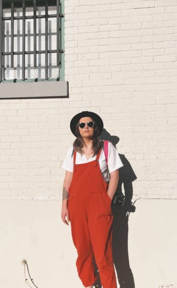 a different reviewer wearing the overalls in red