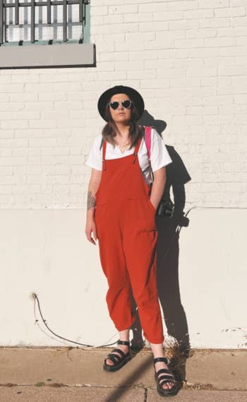 a different reviewer wearing the overalls in red