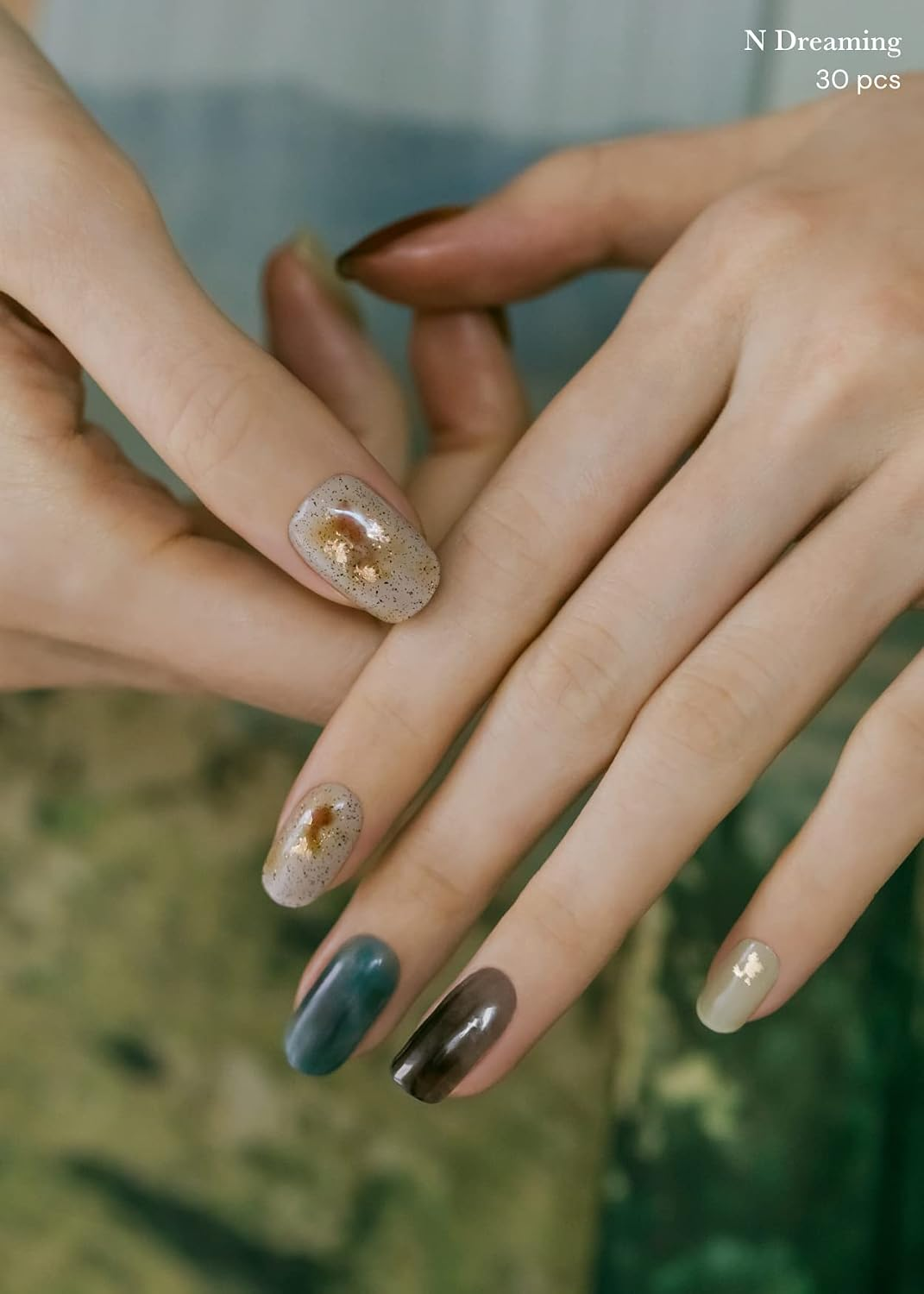 closeup of a manicured manus  with the N Dreaming nails applied