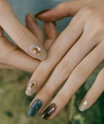 closeup of a manicured manus with the N Dreaming nails applied