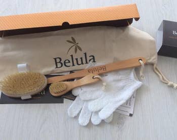 Small brush, hand brush, exfoliating gloves, and extension handle