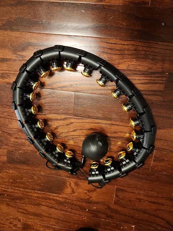the weighted fitness hoop in black