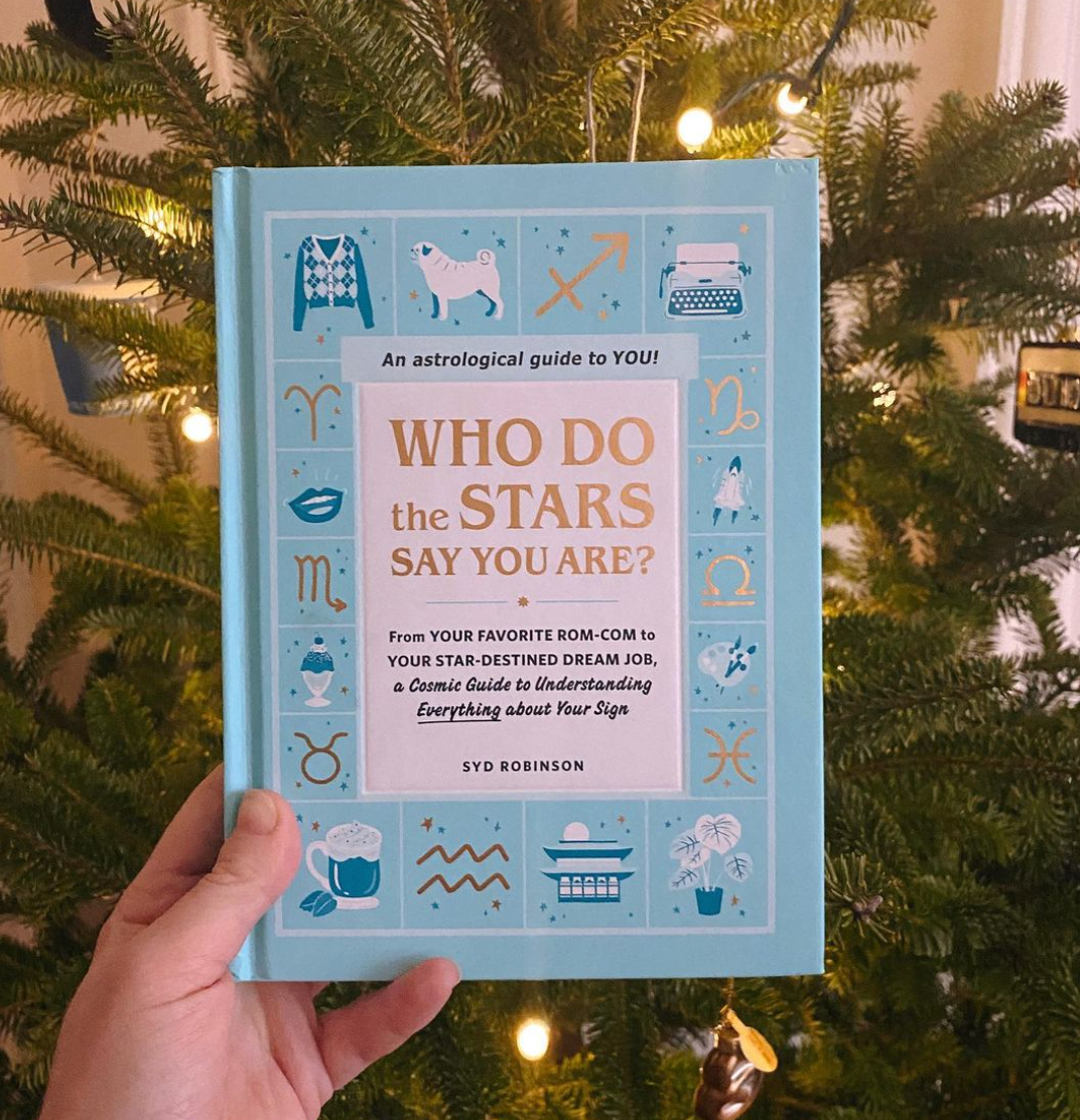 buzzfeed writer and author of who do the stars say you are holding the book