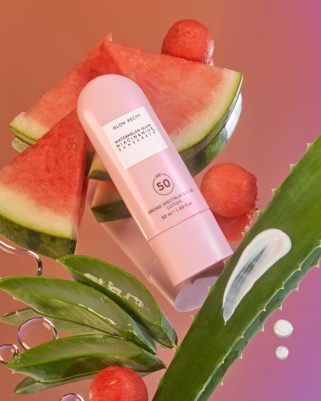 a rounded pink tube of glow recipe sunscreen
