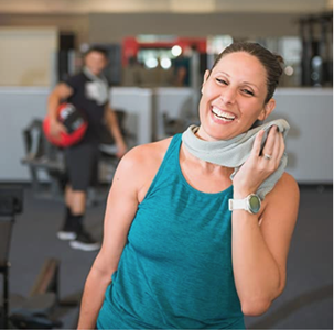 Model wiping their face with gray version 