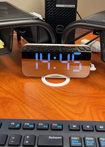 the same clock on a different reviewer's work desk