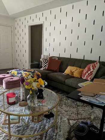 reviewer pic of a living room with black line decals all over the walls