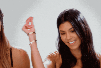 Person wearing casual benignant gestures playfully