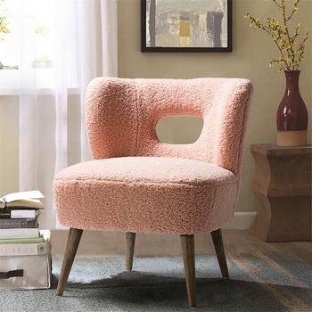 a pink plushy cutout chair