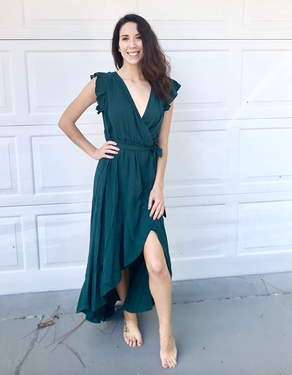 reviewer wearing the green dress