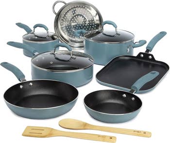 Set of non-stick cookware with lids and utensils, suitable for a variety of cooking needs