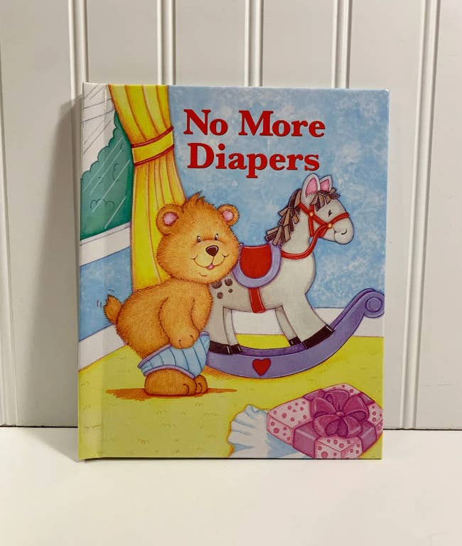 The cover of the book with a bear pulling on their underwear
